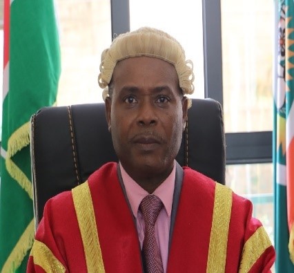 Hon. Wisdom Mwamburi